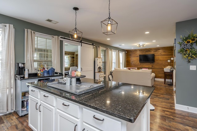 701 Sprucewood Dr, Lexington, KY 40514 - kitchen featuring open floor plan, recessed lighting, a barn door, white cabinets, and a kitchen island