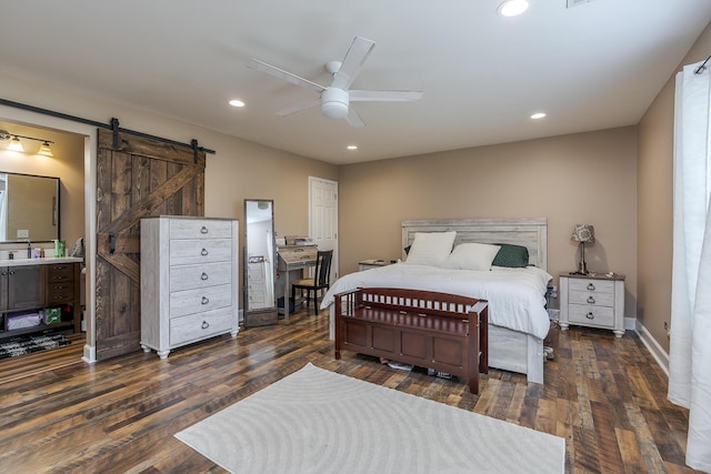 701 Sprucewood Dr, Lexington, KY 40514 - bedroom featuring a barn door, dark wood-type flooring, recessed lighting, a ceiling fan, and ensuite bathroom