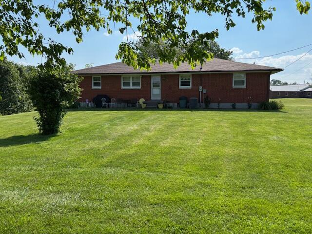 54 Kelley Rd, Mckee, KY 40447 - rear view of property with a lawn and entry steps