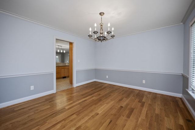 180 Taylors Fork Rd, Richmond, KY 40475 - spare room featuring a chandelier, ornamental molding, wood finished floors, and baseboards