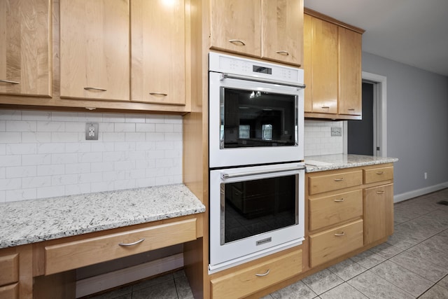 180 Taylors Fork Rd, Richmond, KY 40475 - kitchen featuring white double oven, light tile patterned flooring, tasteful backsplash, light brown cabinets, and light stone counters