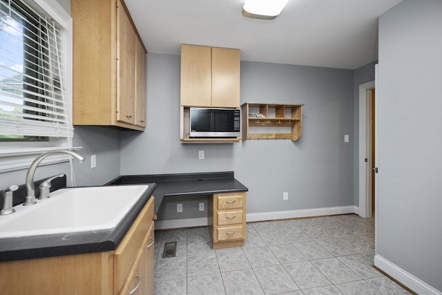 180 Taylors Fork Rd, Richmond, KY 40475 - kitchen featuring a sink, dark countertops, baseboards, and light tile patterned flooring