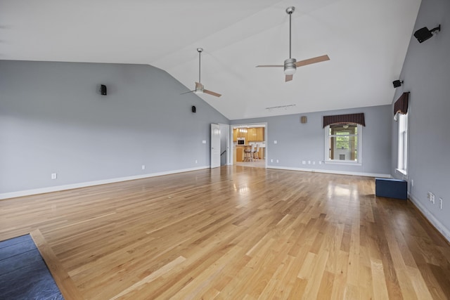 180 Taylors Fork Rd, Richmond, KY 40475 - unfurnished living room with a ceiling fan, light wood finished floors, high vaulted ceiling, and baseboards