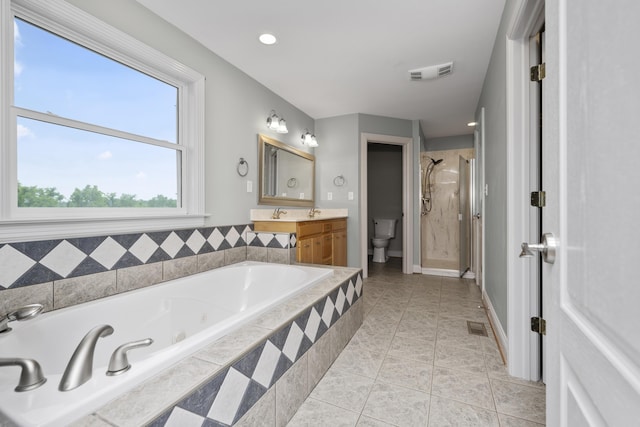180 Taylors Fork Rd, Richmond, KY 40475 - full bath featuring a jetted tub, vanity, a shower stall, tile patterned floors, and toilet