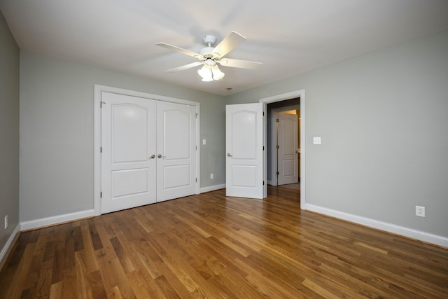 180 Taylors Fork Rd, Richmond, KY 40475 - unfurnished bedroom with baseboards, wood finished floors, a closet, and ceiling fan