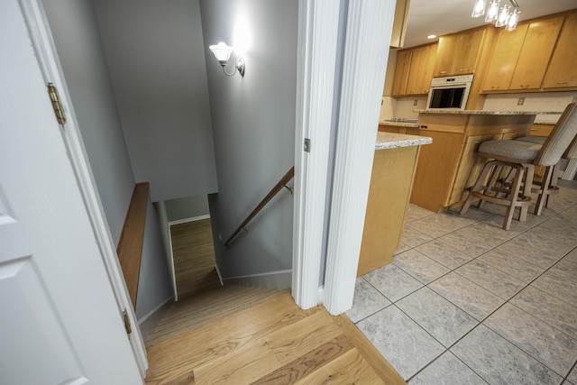 180 Taylors Fork Rd, Richmond, KY 40475 - staircase with baseboards and tile patterned floors