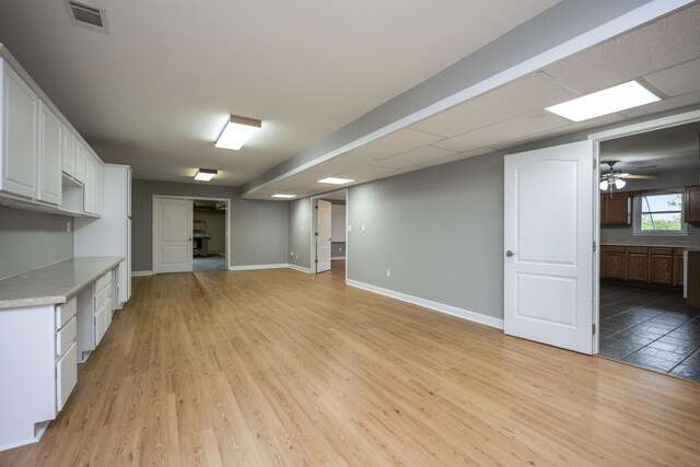 180 Taylors Fork Rd, Richmond, KY 40475 - unfurnished living room with baseboards, light wood-style flooring, and ceiling fan
