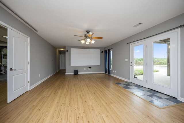 180 Taylors Fork Rd, Richmond, KY 40475 - unfurnished living room with wood finished floors, a ceiling fan, and baseboards