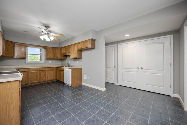 180 Taylors Fork Rd, Richmond, KY 40475 - kitchen featuring white dishwasher, a sink, baseboards, a ceiling fan, and brown cabinets
