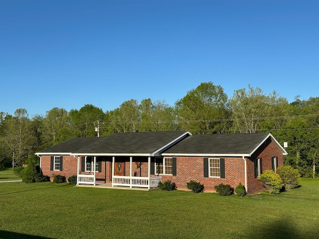 7532 Maysville Rd, Carlisle, KY 40311 - single story home featuring covered porch, a front lawn, and brick siding