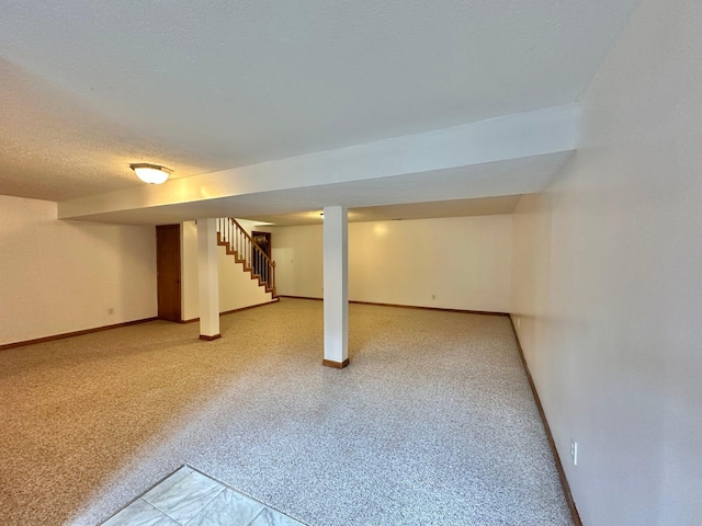7532 Maysville Rd, Carlisle, KY 40311 - finished below grade area featuring baseboards, stairs, and a textured ceiling