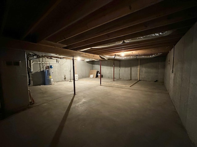 7532 Maysville Rd, Carlisle, KY 40311 - unfinished basement with water heater