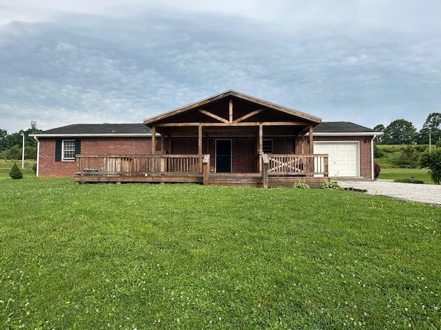7532 Maysville Rd, Carlisle, KY 40311 - ranch-style house with driveway, an attached garage, brick siding, and a front yard