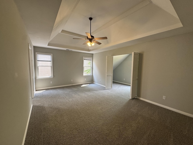 3017 Polo Club Blvd, Lexington, KY 40509 - spare room with a raised ceiling, a ceiling fan, carpet floors, and baseboards