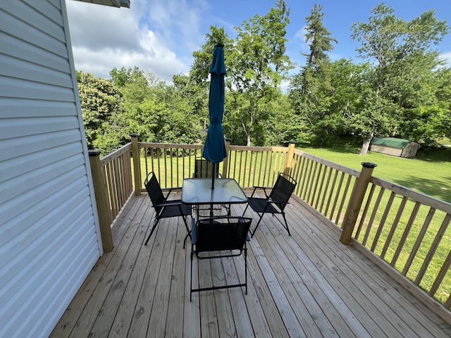 104 Steele St, Corbin, KY 40701 - wooden terrace with outdoor dining space and a lawn
