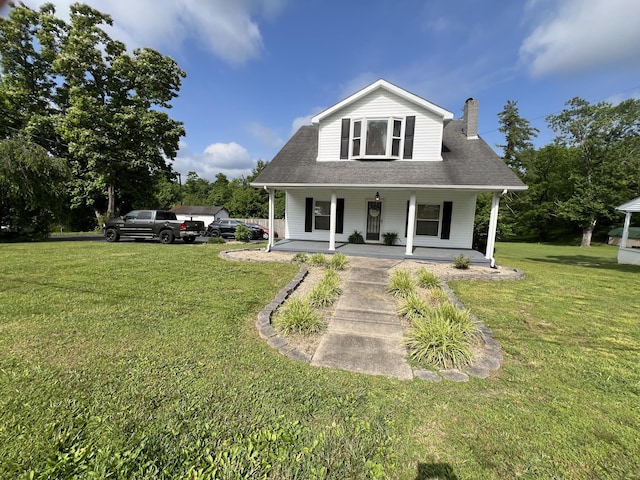 104 Steele St, Corbin, KY 40701 - bungalow featuring a chimney, covered porch, and a front lawn