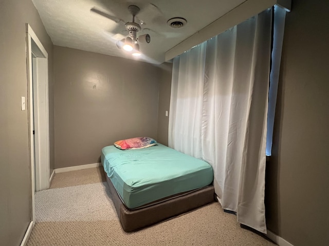 104 Steele St, Corbin, KY 40701 - bedroom featuring light carpet, baseboards, and ceiling fan