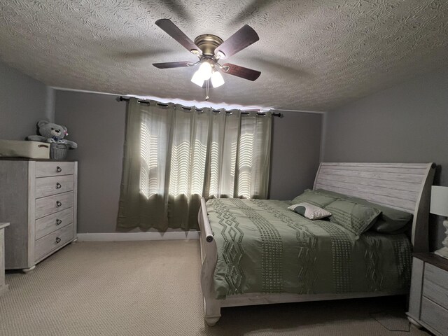104 Steele St, Corbin, KY 40701 - bedroom with light carpet, a ceiling fan, and a textured ceiling