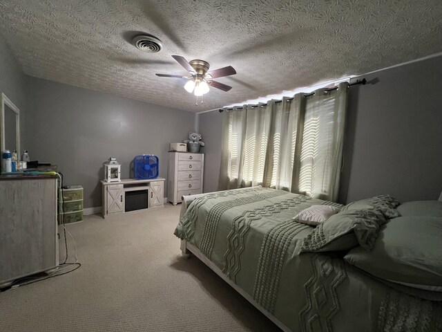 104 Steele St, Corbin, KY 40701 - carpeted bedroom featuring a ceiling fan and a textured ceiling