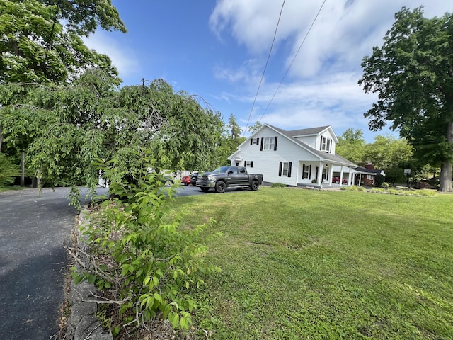 104 Steele St, Corbin, KY 40701 - view of home's exterior with a porch, a yard, and driveway