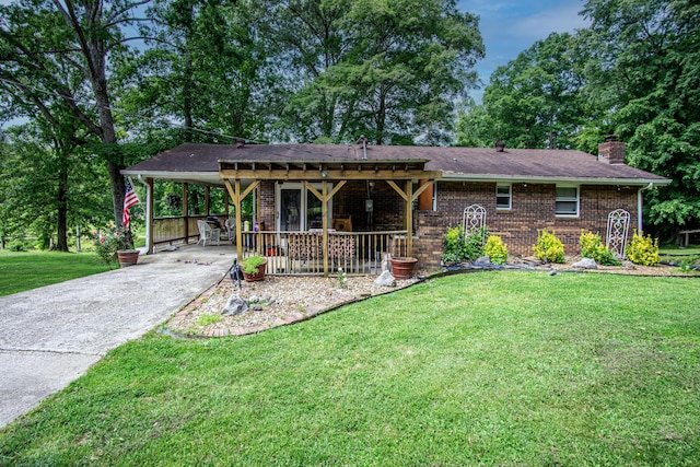 1540 Stoney Fork Rd, Corbin, KY 40701 - single story home featuring a chimney, a front lawn, driveway, brick siding, and a carport