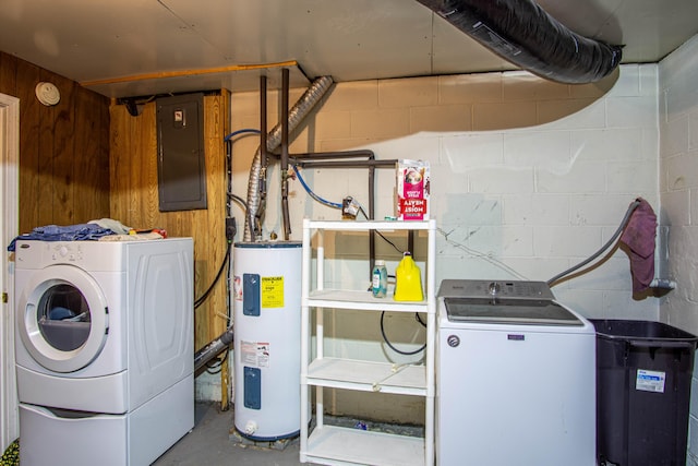 1540 Stoney Fork Rd, Corbin, KY 40701 - laundry area with electric water heater, electric panel, concrete block wall, wood walls, and washer and dryer