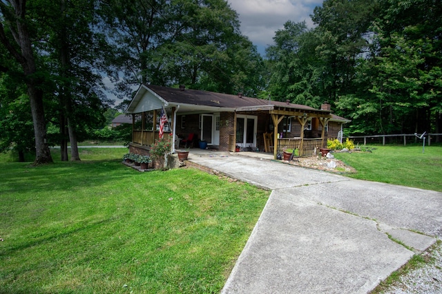1540 Stoney Fork Rd, Corbin, KY 40701 - ranch-style home featuring driveway, a chimney, covered porch, and an attached carport