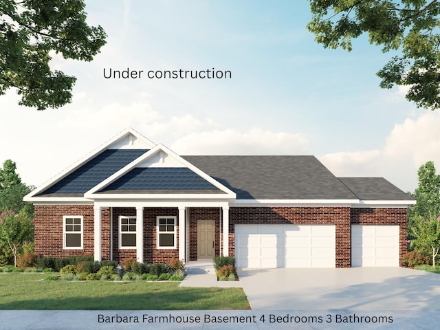 137 Meadow Lark Trl, Georgetown, KY 40324 - view of front facade featuring an attached garage, brick siding, and a front yard