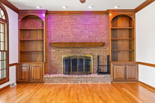 2128 Leafland Pl, Lexington, KY 40515 - unfurnished living room with light wood finished floors, baseboards, a fireplace, built in shelves, and ornamental molding
