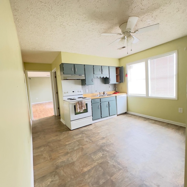 630 Blakely Rd, London, KY 40744 - kitchen featuring white appliances, under cabinet range hood, a textured ceiling, ceiling fan, and light countertops