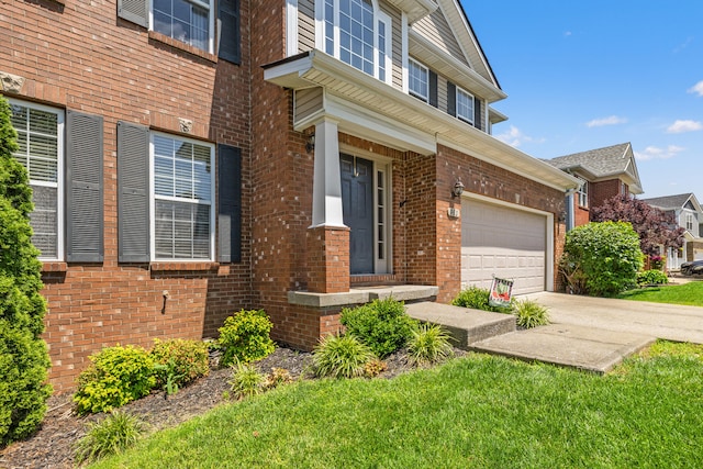 962 Cobble Dr, Richmond, KY 40475 - doorway to property featuring brick siding, driveway, and a yard