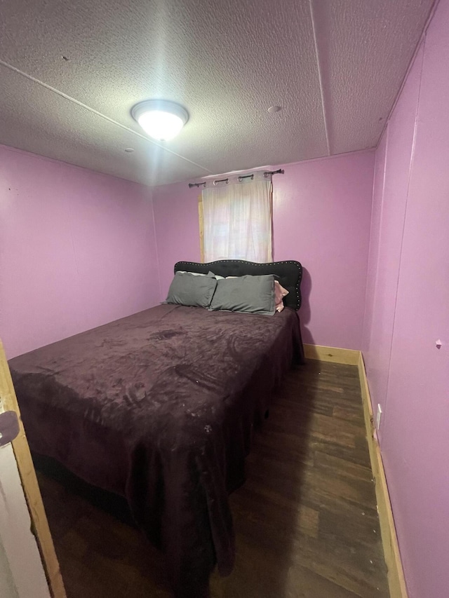 58 William Ct, Nancy, KY 42544 - bedroom with wood finished floors and a textured ceiling
