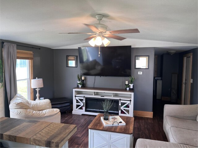 58 William Ct, Nancy, KY 42544 - living area with lofted ceiling, dark wood-style floors, ceiling fan, and baseboards
