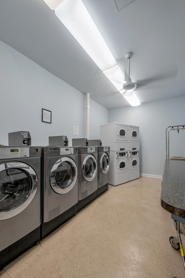 2121 Nicholasville Rd Unit 910, Lexington, KY 40503 - communal laundry room with stacked washer / dryer, washer and dryer, a ceiling fan, and baseboards