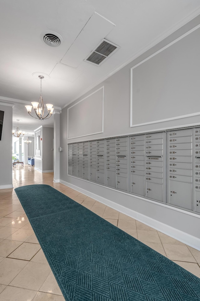 2121 Nicholasville Rd Unit 910, Lexington, KY 40503 - view of community with a chandelier, crown molding, and mail area