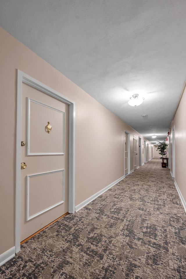 2121 Nicholasville Rd Unit 910, Lexington, KY 40503 - corridor featuring carpet flooring and baseboards