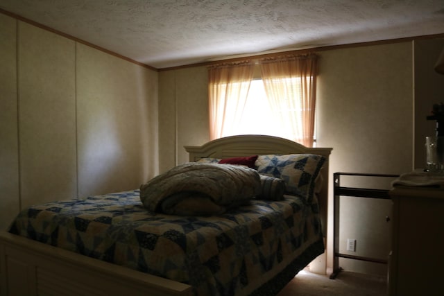 164 Oxbow Rd, Carlisle, KY 40311 - bedroom with a textured ceiling, crown molding, and carpet flooring