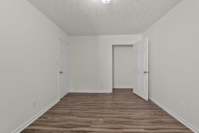 330 Corral St, Lexington, KY 40508 - unfurnished room with dark wood-style flooring and a textured ceiling