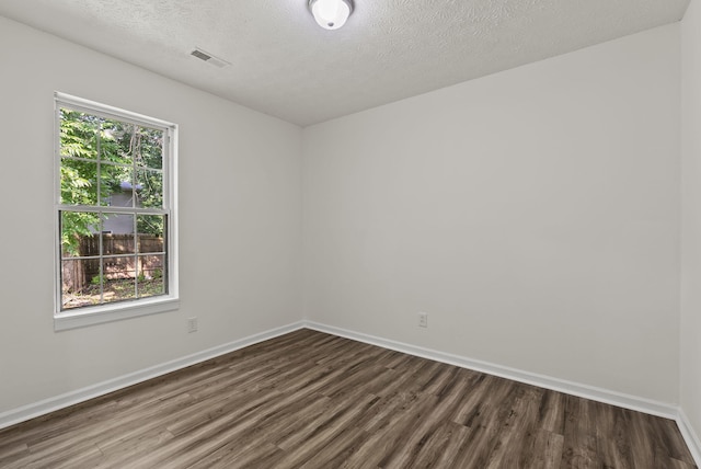 330 Corral St, Lexington, KY 40508 - unfurnished room with dark wood-style floors and a textured ceiling