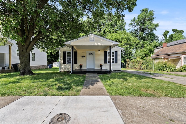 330 Corral St, Lexington, KY 40508 - bungalow featuring covered porch and a front lawn