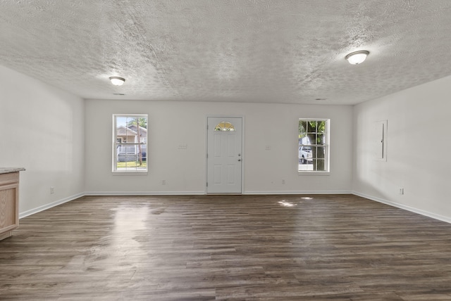 330 Corral St, Lexington, KY 40508 - unfurnished living room featuring dark wood finished floors and a textured ceiling