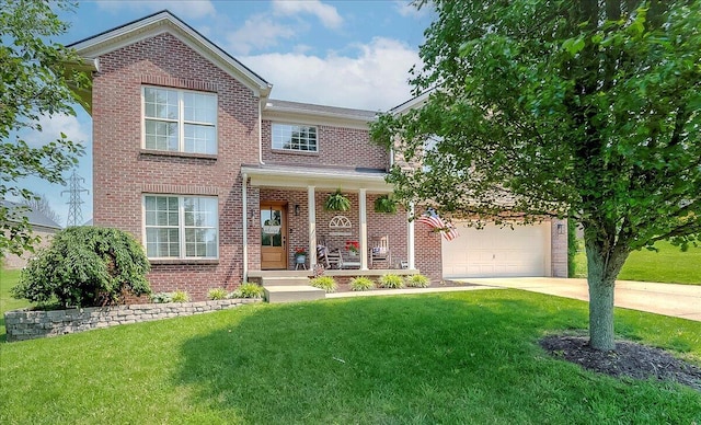 105 Geneva Ct, Nicholasville, KY 40356 - view of front of home featuring brick siding, concrete driveway, a front lawn, and a porch