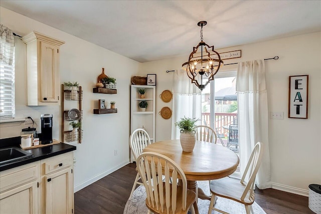 105 Geneva Ct, Nicholasville, KY 40356 - dining area with a chandelier, plenty of natural light, dark wood finished floors, and baseboards
