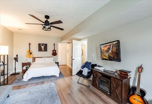 105 Geneva Ct, Nicholasville, KY 40356 - bedroom featuring wood finished floors, a ceiling fan, and baseboards