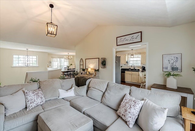 105 Geneva Ct, Nicholasville, KY 40356 - living area featuring a chandelier and vaulted ceiling