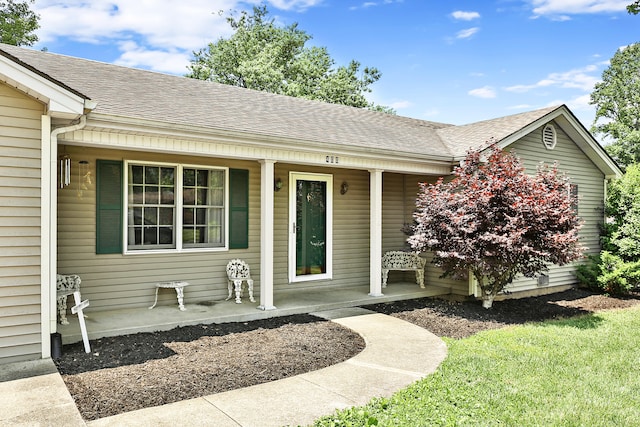 400 Aspen Dr, Lawrenceburg, KY 40342 - view of exterior entry featuring a porch and a shingled roof