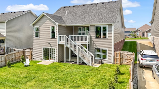109 Palumbo Pl, Georgetown, KY 40324 - back of property featuring a gate, stairway, a shingled roof, and a deck