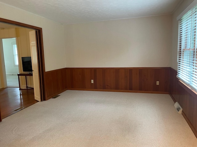 411 Ohara Dr, Danville, KY 40422 - carpeted spare room featuring healthy amount of natural light and wainscoting