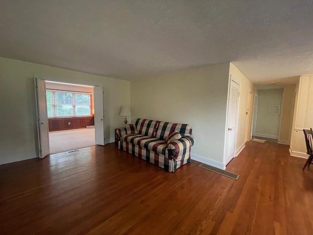 411 Ohara Dr, Danville, KY 40422 - living area with wood finished floors and a textured ceiling