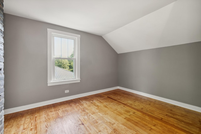 611 Old Shakertown Rd, Danville, KY 40422 - additional living space featuring vaulted ceiling, light wood-type flooring, and baseboards